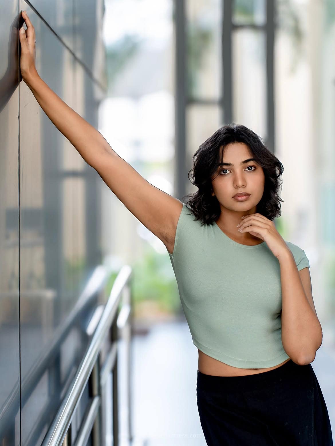 Shivathmika Rajashekar in sage green crop top and black trousers Shivathmika Rajashekar in sage green crop top and black trousers