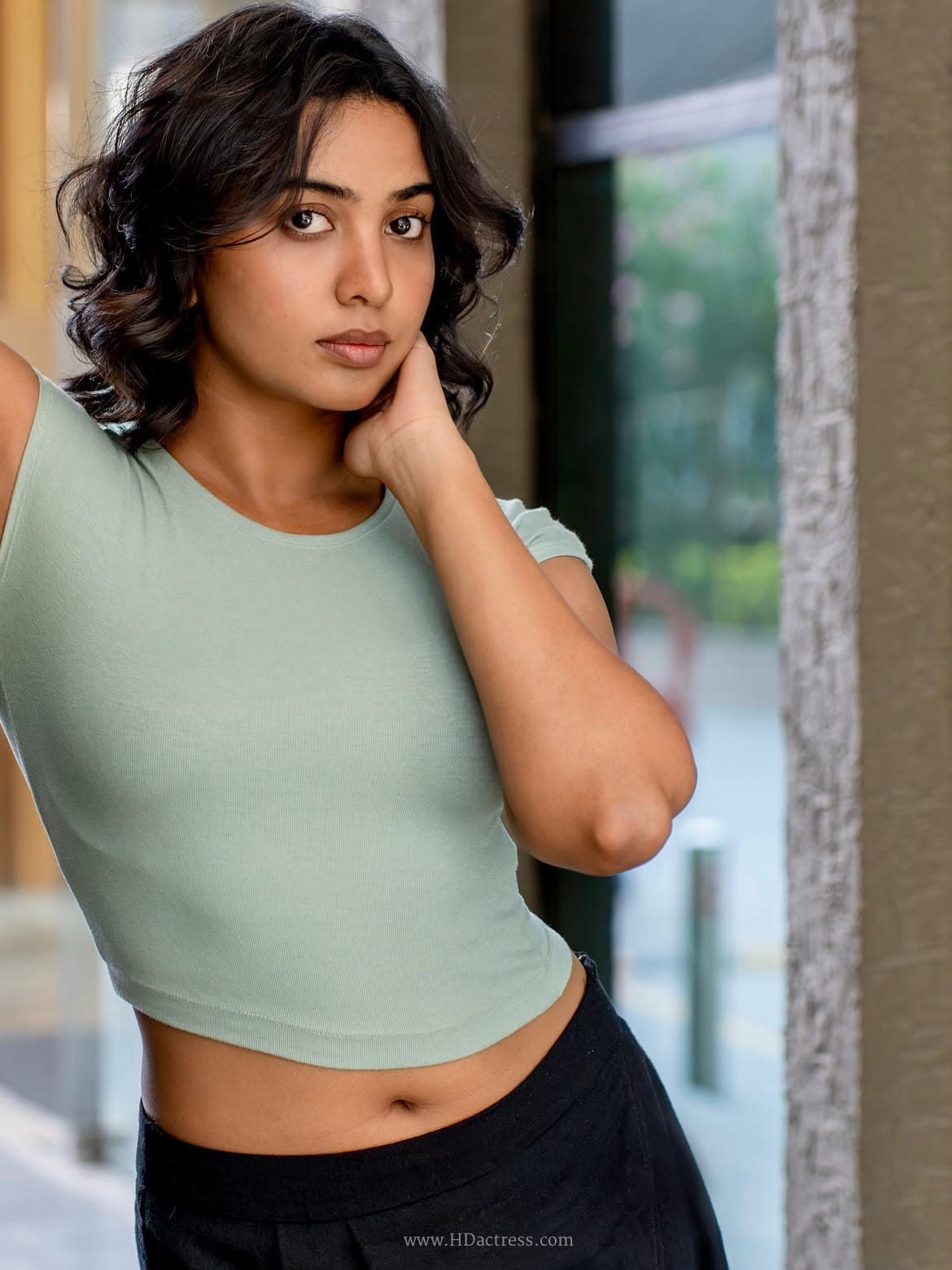 Shivathmika Rajashekar in sage green crop top and black trousers Shivathmika Rajashekar in sage green crop top and black trousers