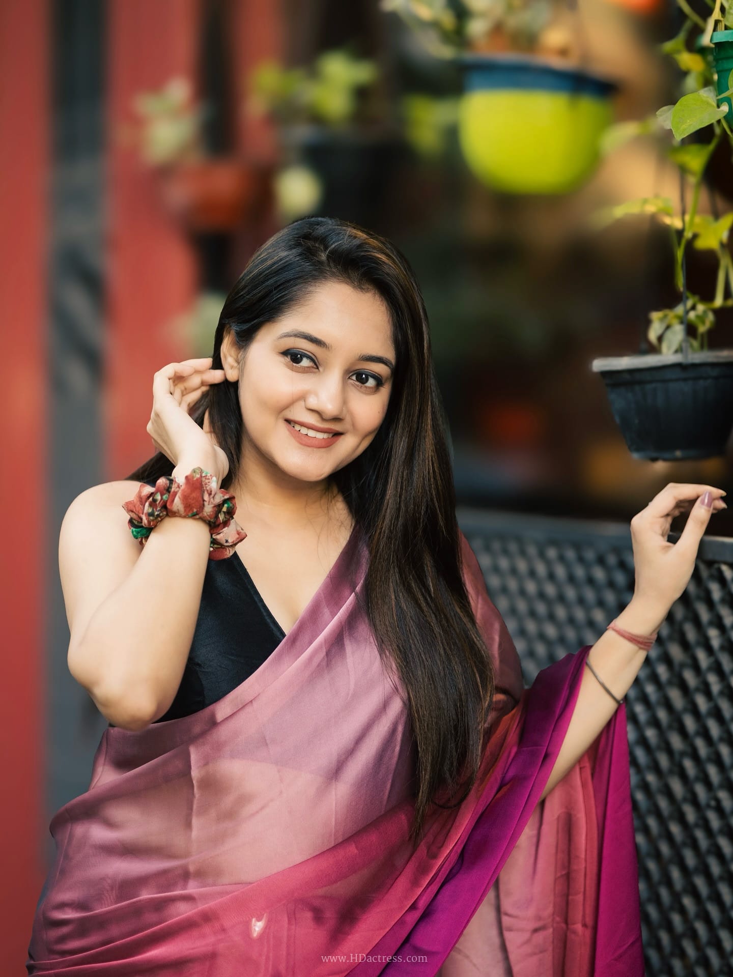 Moumita in ombre satin saree and black blouse