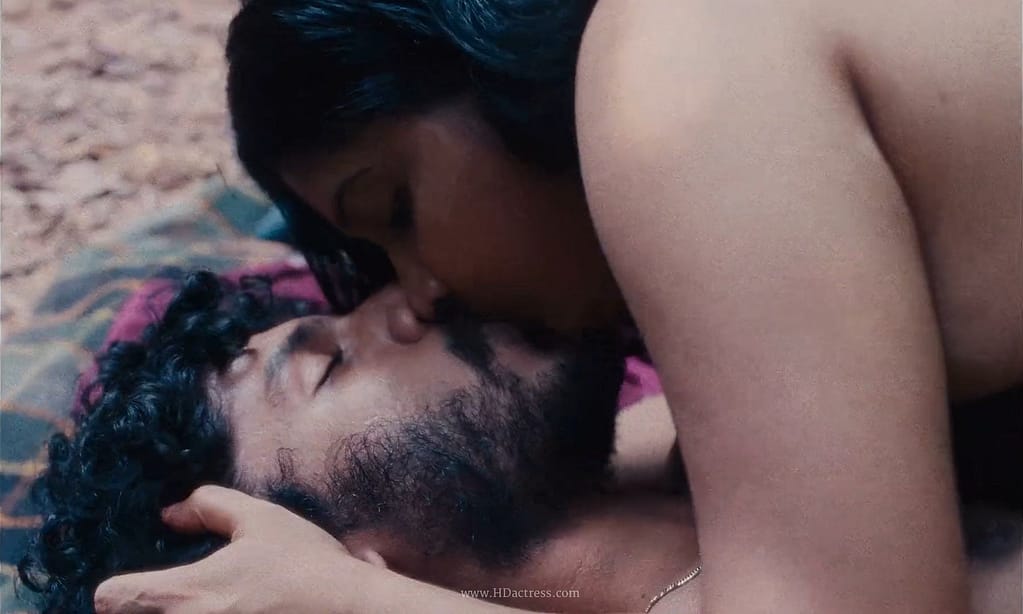 Cinematic wide shot of Divya Prabha and co-star in a beautifully lit, deeply emotional romantic sequence.