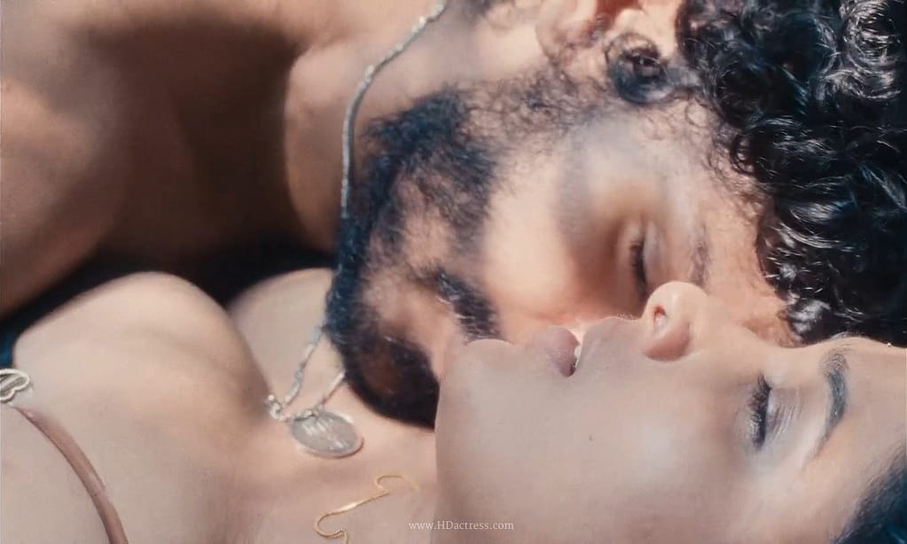 Close-up photo of actress Divya Prabha expressing profound emotion in a raw, authentic cinematic still.