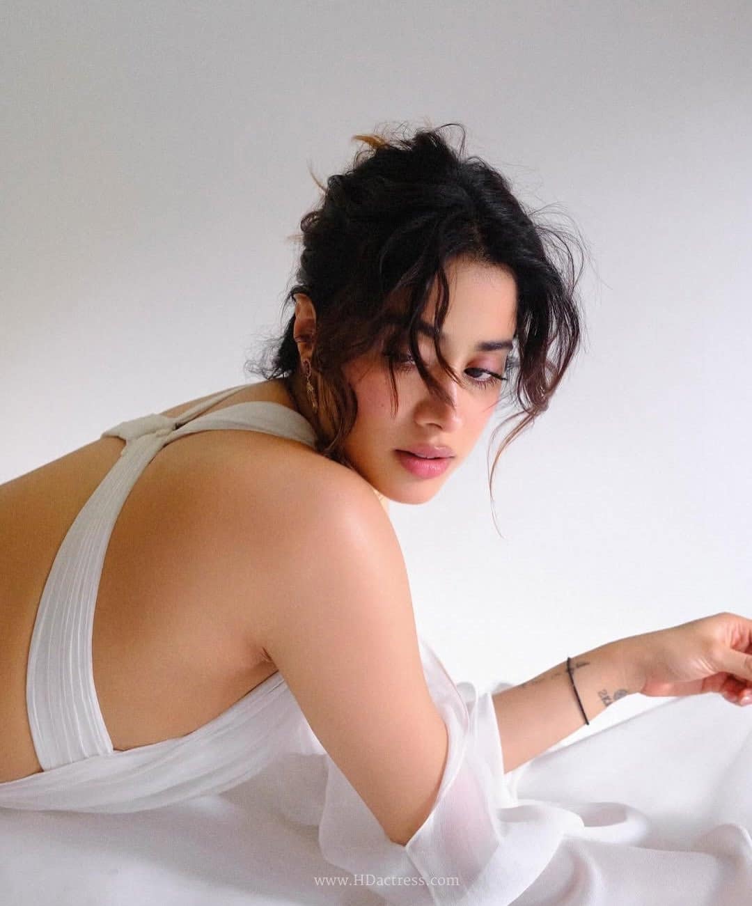 janhvi kapoor, janhvi kapoor fashion, backless maxi dress, open back dress, wide strap dress, celebrity summer style, bollywood fashion trends, jaw-dropping celebrity outfits