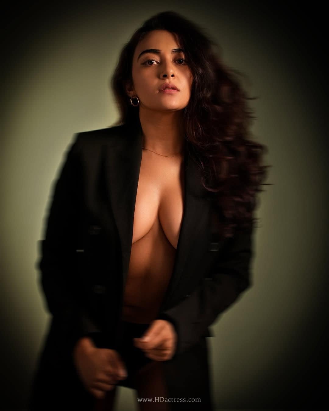 Close up portrait of actress Jinal J Joshi wearing a stylish form-fitting chic dress for a viral media campaign.