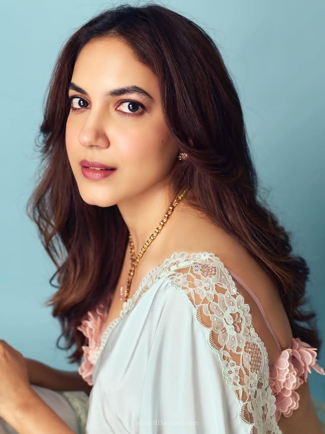 Ritu Varma looking incredibly sultry in a designer saree with a dramatic, alluring facial expression during a viral photo session.