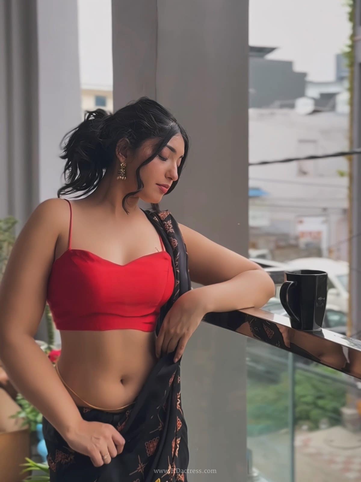 Divya in red blouse and black printed saree Divya in red blouse and black printed saree