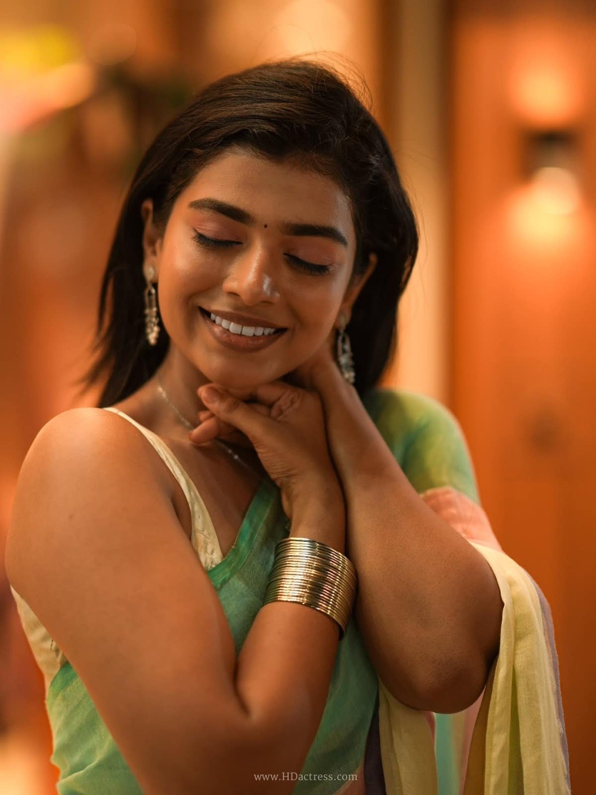 Swetha Kumar in pastel multicolored striped saree Swetha Kumar in pastel multicolored striped saree