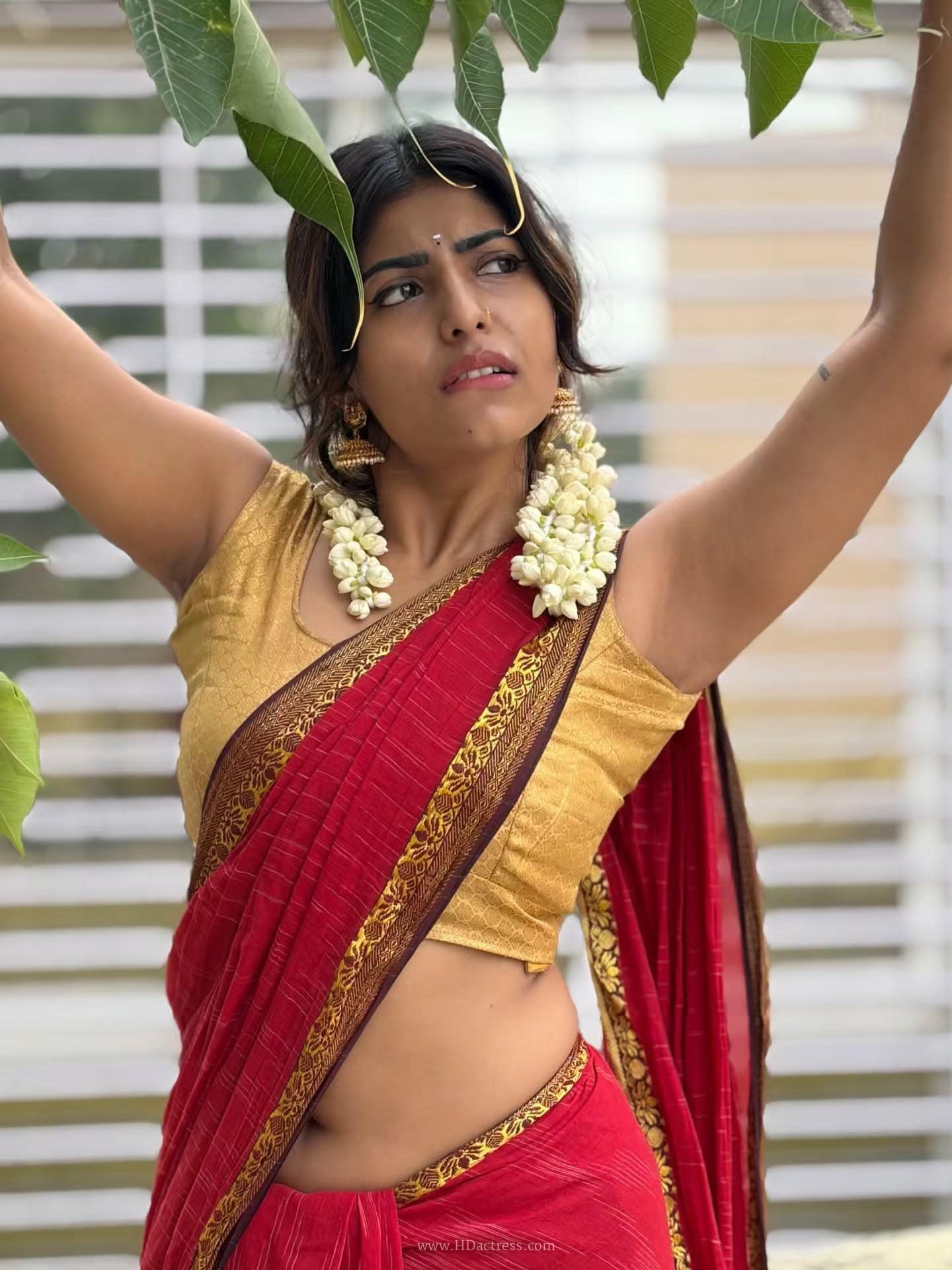 Shyamala Dattaraj in red cotton saree and gold blouse