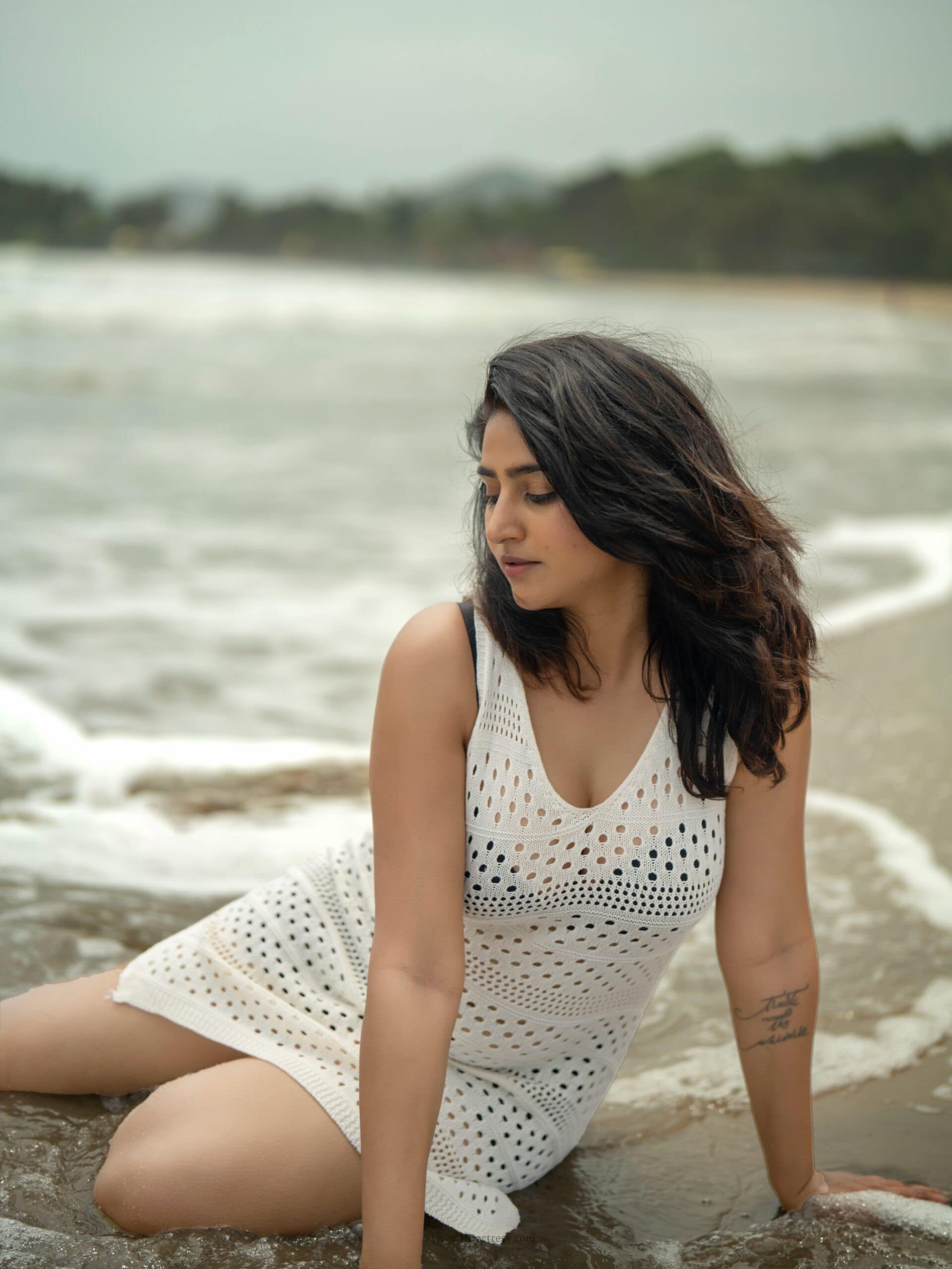varshini sounderajan, varshini sounderajan photos, mesh cover-up dress, sleeveless v-neck dress, sheer fashion trends, tollywood actress hot photos, varshini sounderajan viral style, celebrity photoshoot updates, bold sheer outfits, anchor varshini latest images