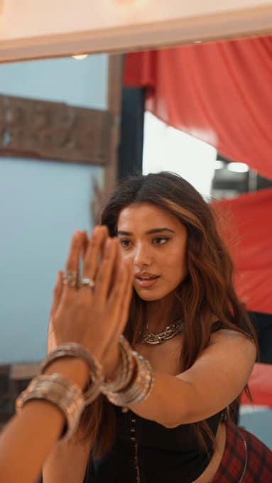 How does Ketika Sharma maintain her flawless look for close-up photography?