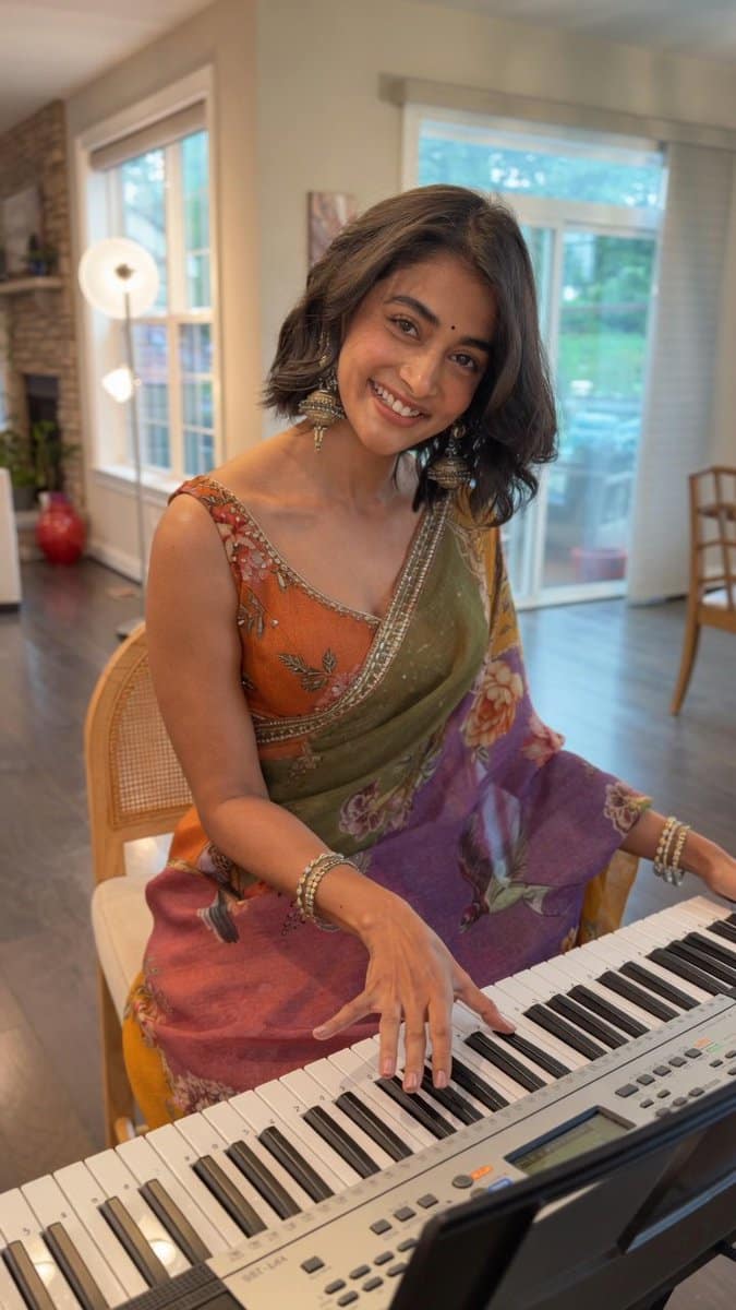 Pooja Hegde is figuring out how to compose her favourite tune ringing in her mind. ❤️ #PoojaHegde