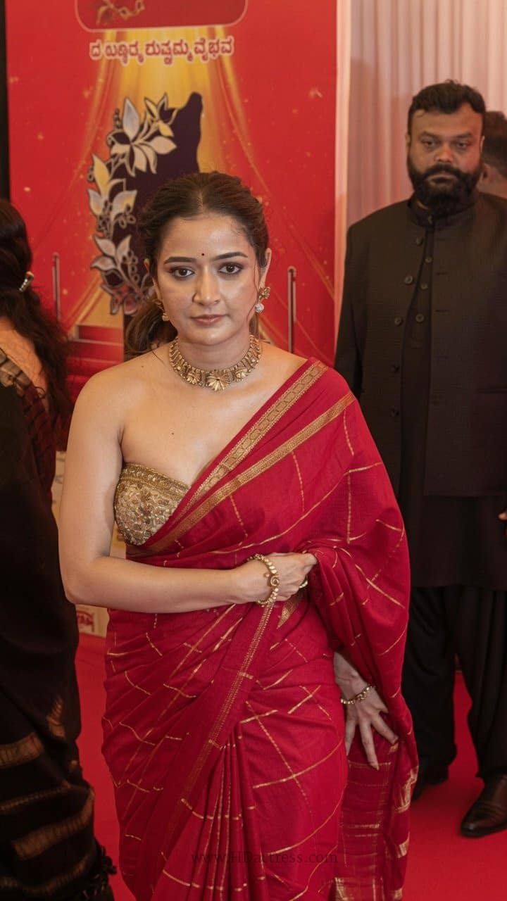 Ashika Ranganath, red saree, sleeveless blouse, viral photos, Indian actress fashion, saree inspiration, celebrity style trends, South cinema style.